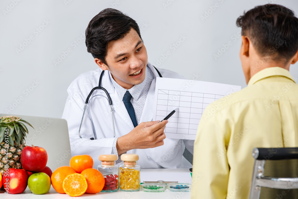 Doctor talking to patient during appointment Doctor talking to patient during appointment