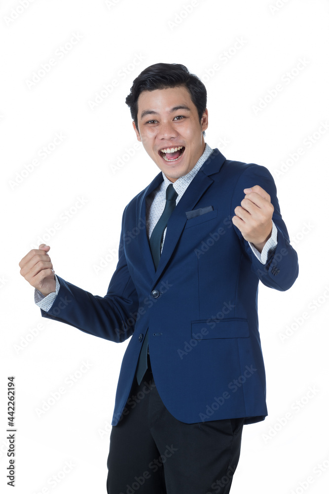 Young attractive asian business man wearing navy blue suit with white shirt and necktie smiling. Put his fists out celebrating and looking cheerful and successful on white background isolated Young attractive asian business man wearing navy blue suit with white shirt and necktie smiling. Put his fists out celebrating and looking cheerful and successful on white background isolated