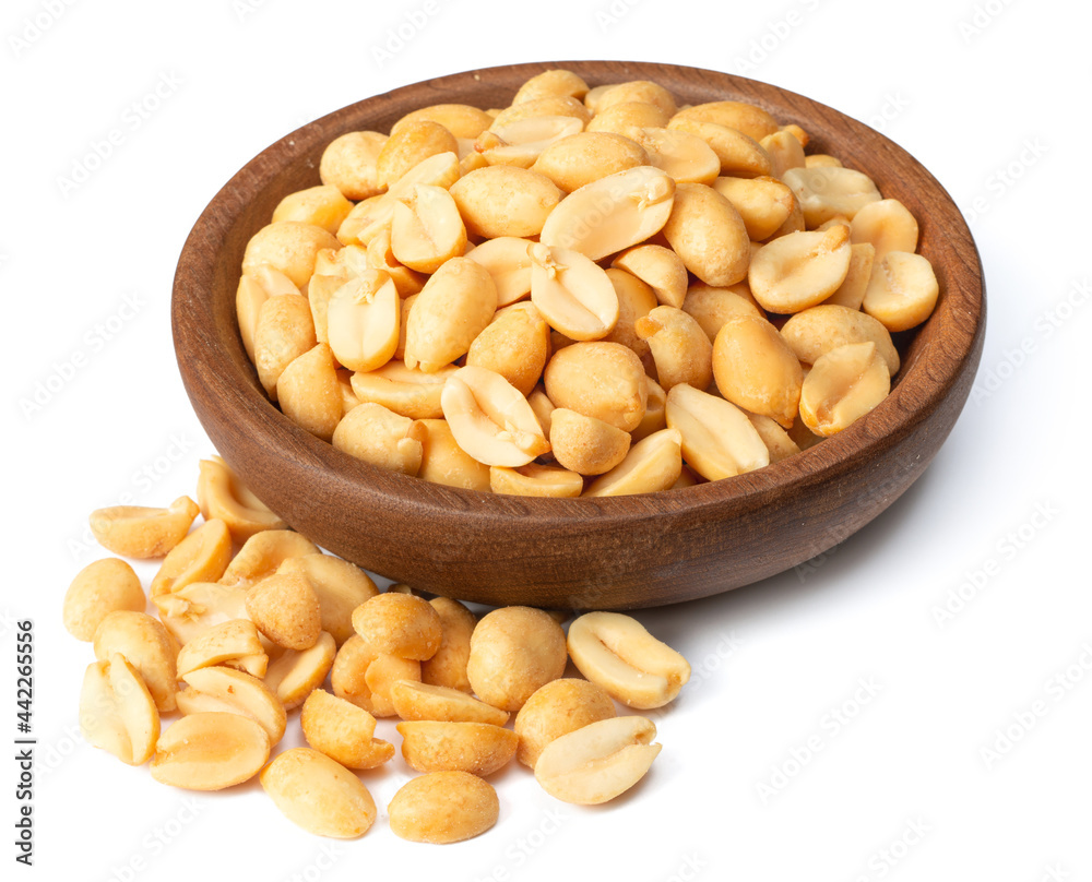 cooked peanuts in the wooden plate, isolated on white background