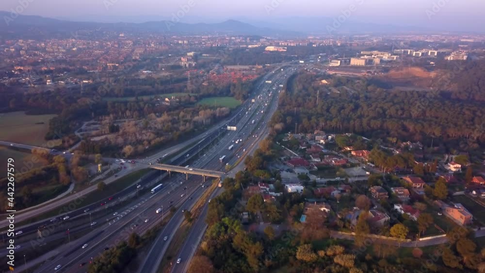 Panorama Of Moderate Traffic At AP-7 Toll Motorway In Sant Cugat del Valles, Barcelona, Spain. aerial Panorama Of Moderate Traffic At AP-7 Toll Motorway In Sant Cugat del Valles, Barcelona, Spain. aerial