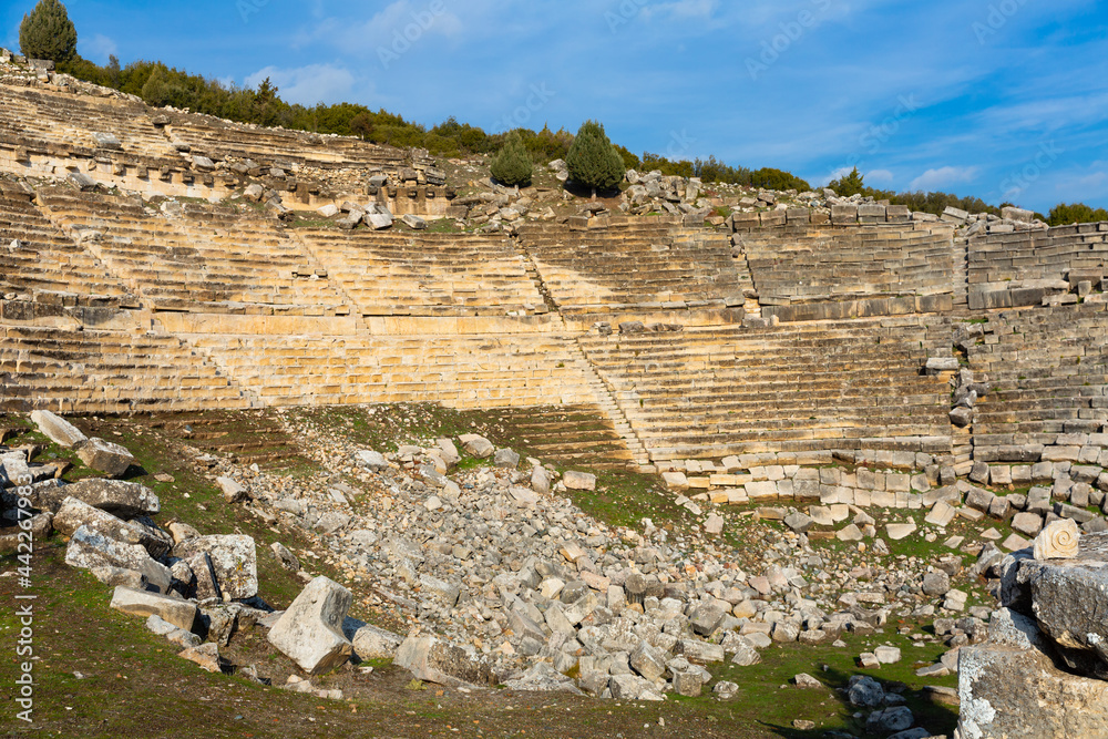 Ruined antique theater at archaeological site of ancient settlement of Kibyra on sunny winter day, Turkey