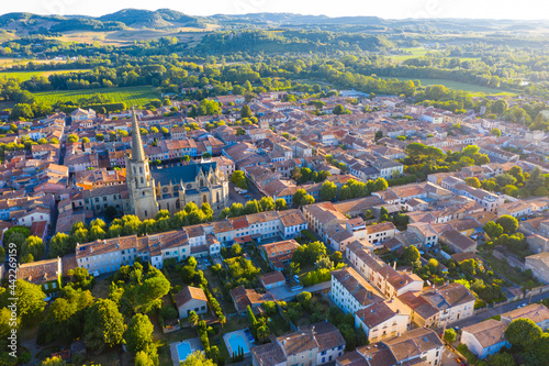 Picturesque summer view from drone of French township of Mirepoix with Cathedral of Saint Maurice, Ariege department..