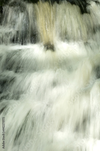 Silky water of Day Pond Falls in Colchester  Connecticut.