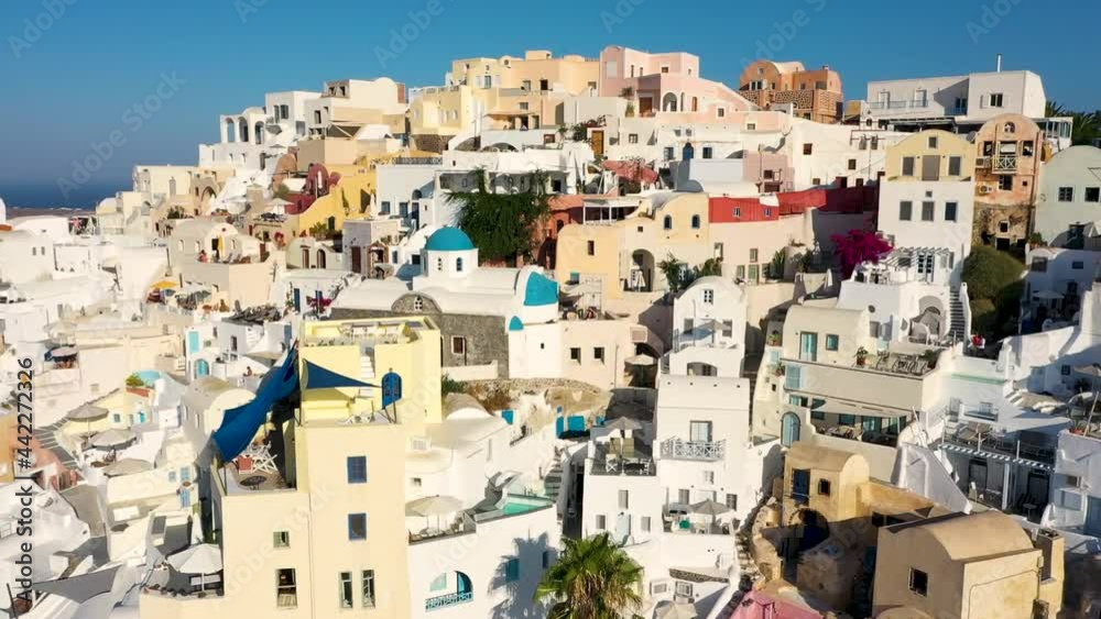 Panoramic view of Santorini with its famous white and colourful picturesque village of Oia built on a cliff, Cycladic islands, Greece. Beautiful summer european landscape Panoramic view of Santorini with its famous white and colourful picturesque village of Oia built on a cliff, Cycladic islands, Greece. Beautiful summer european landscape