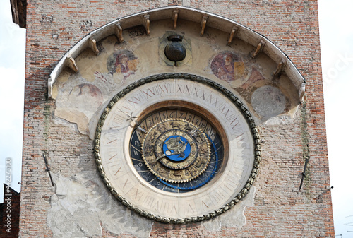 Big tower clock in Piazza delle Erbe. Mantova. Italy