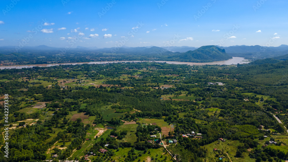 aerial panoramic top view of Mae Khong river Mountain forest views of Laos and Chiang Khan town from Phu Thok hill viewpoint, Chiangkan, Loei province, Thailand