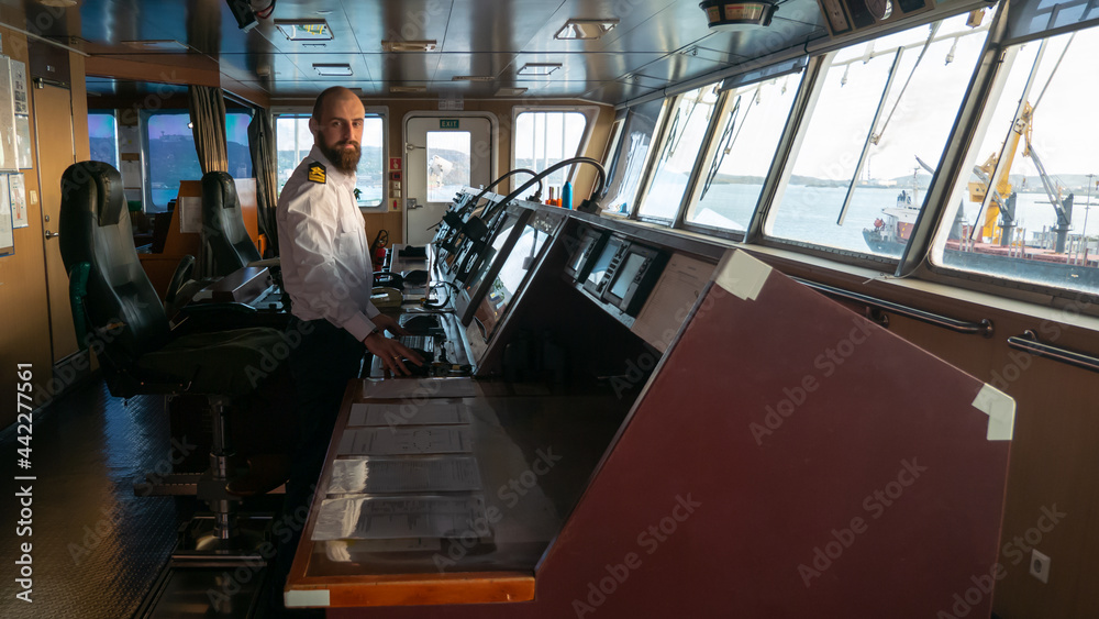 Navigational merchant officer watching keeping navigational watch on ...