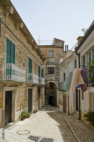 A narrow street among the old houses of Bovino, a medieval village in the Puglia region.