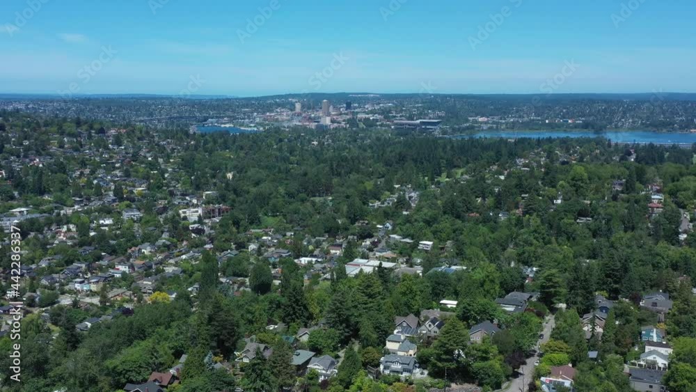 Drone flying over Madison Valley in Seattle with views of Lake Union, the Aurora Bridge, Fremont and University of Washington.