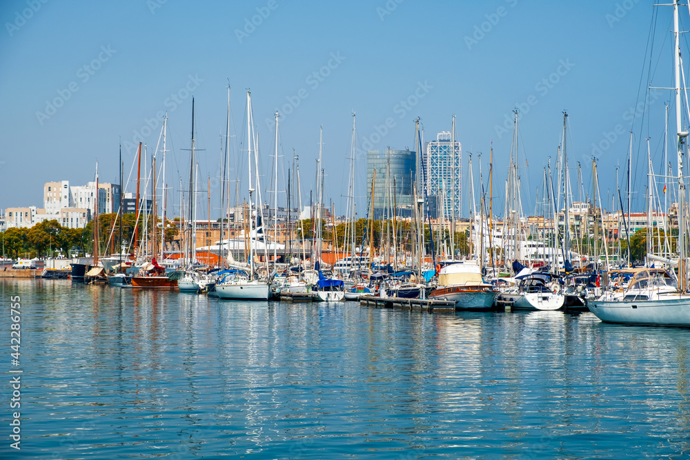 The port of the city of Barcelona with many sailing ships. Europe's main port on the Mediterranean