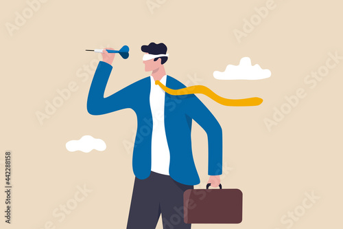 Unclear target or blind business vision, leadership failure or mistake aiming goal, untrained or uneducated management concept, confused businessman blindfold throwing dart. photo