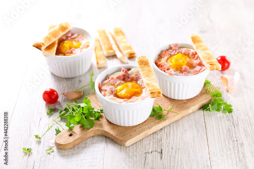 baked egg with bacon and cream