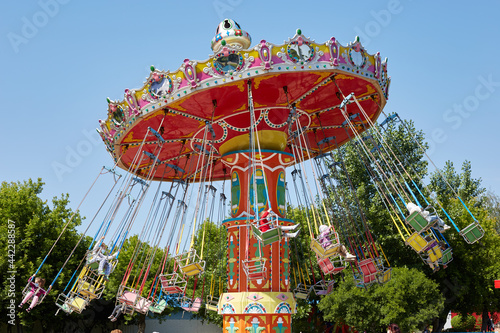 Carousel in the amusement park fun and joy at the fair