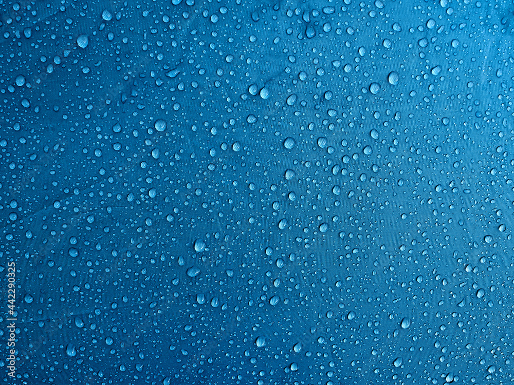Water drops on waterproof membrane fabric. Morning dew on tent. Water drops on waterproof membrane fabric. Morning dew on tent.
