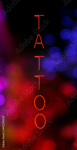 Neon Signs Vintage Neon Sign Tattoo With Bokeh photo