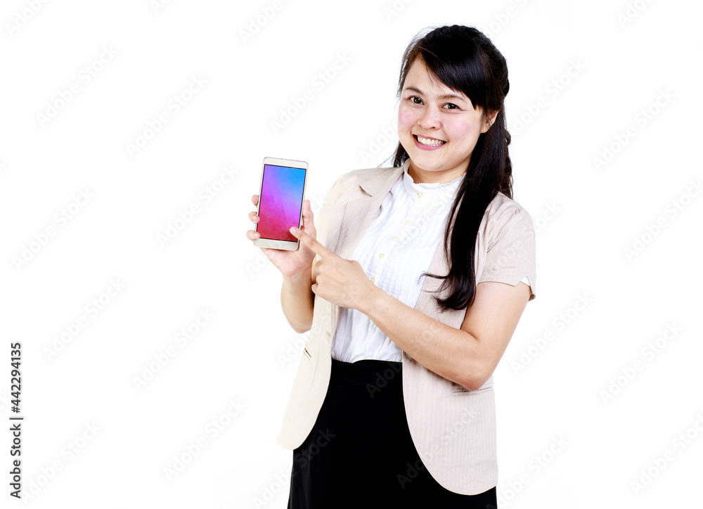 Happy young Asian office employee in elegant clothes using app on mobile phone against white background Happy young Asian office employee in elegant clothes using app on mobile phone against white background