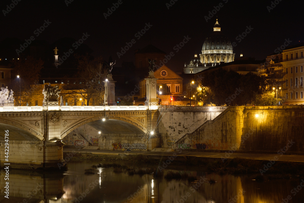 Rome (Italy). Night view of the Sant'Angelo bridge over the Tiber river in the city of Rome.