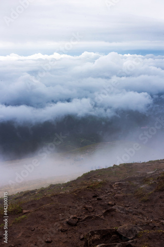 Scenic view of mountains against sky. Stone road to nowhere in the mountains. fog. cloudy weather. In Ukrainian Carpathian Mountains