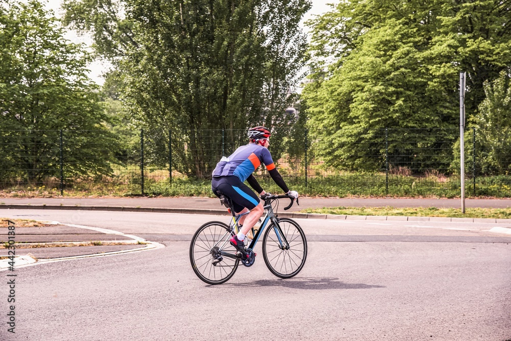cycling on the streets of the city , weekend sports and recreation cycling on the streets of the city , weekend sports and recreation