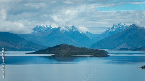 View from Bennets Bluff Lookout over Lake Wakatipu, Pig Island and Pigeon Island and Mt Aspiring National Park. Mt Creighton, Queenstown Lakes district, Otago region, South Island.
