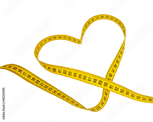 Yellow heart tape measure isolated on the white background