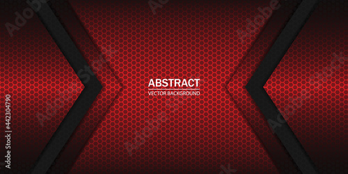 Geometric arrow shapes on a hexagonal red grid. Black and red shapes, stripes and lines on a dark hexagonal carbon fiber background.