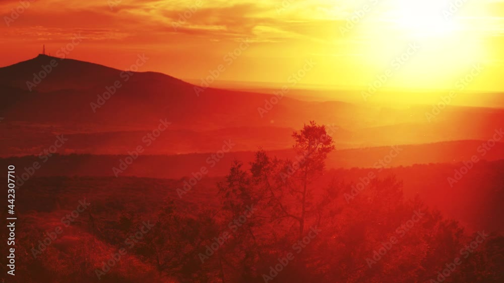 Burning sunset in mountains. Evening nature landscape in province of Burgos, Castile and Leon community, northern Spain. Burning sunset in mountains. Evening nature landscape in province of Burgos, Castile and Leon community, northern Spain.