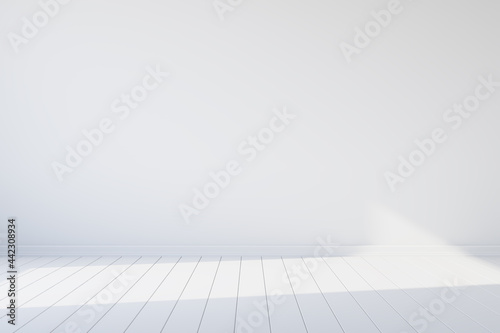Empty white room with woode...