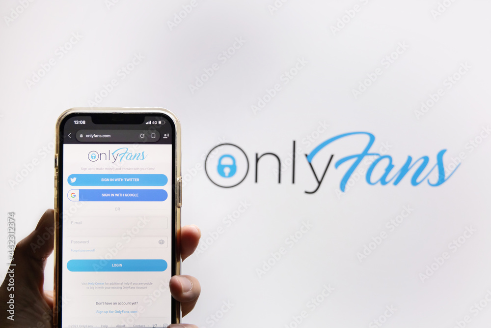 View of The Hand Holding a Mobilephone with Onlyfans Logo on the Screen  Against Onlyfans Logo Background foto de Stock | Adobe Stock