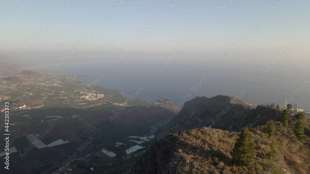 Man on top of cliff, amazing view of La Palma, Canary Islands, Spain Man on top of cliff, amazing view of La Palma, Canary Islands, Spain