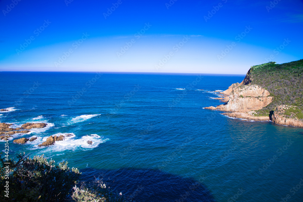 Entrance to the Knysna lagoon where the lagoon and the ocean meet. Photo is taken from the The Heads at Knysna