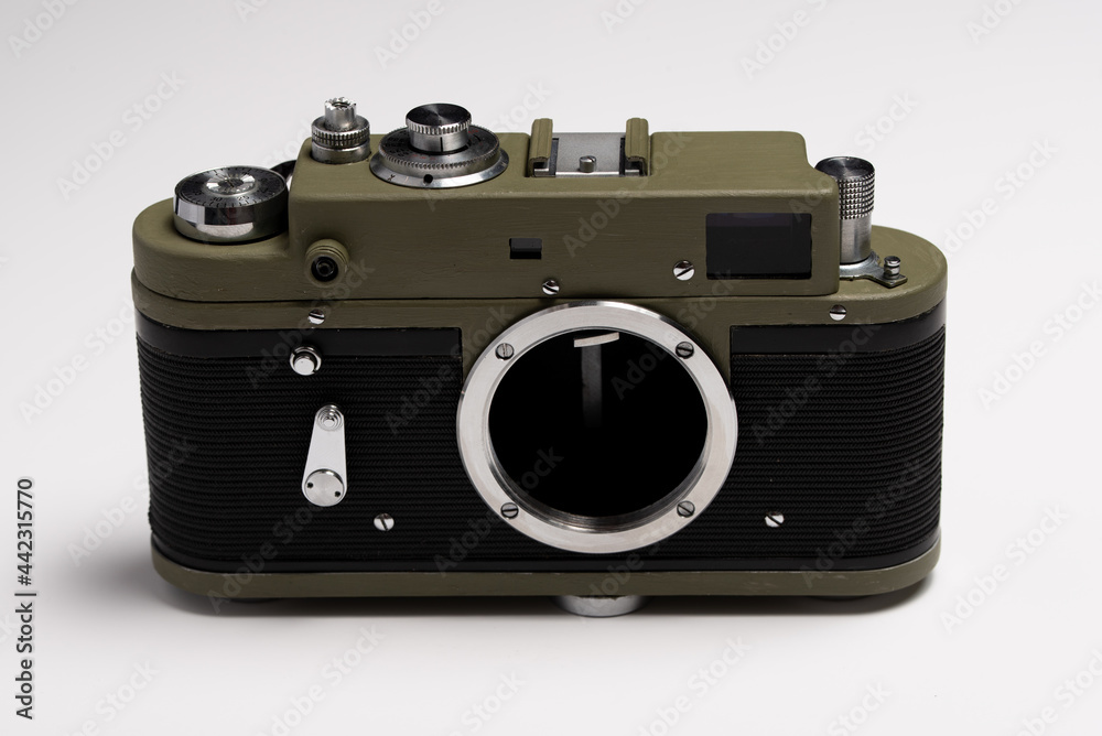 Old film khaki camera isolated