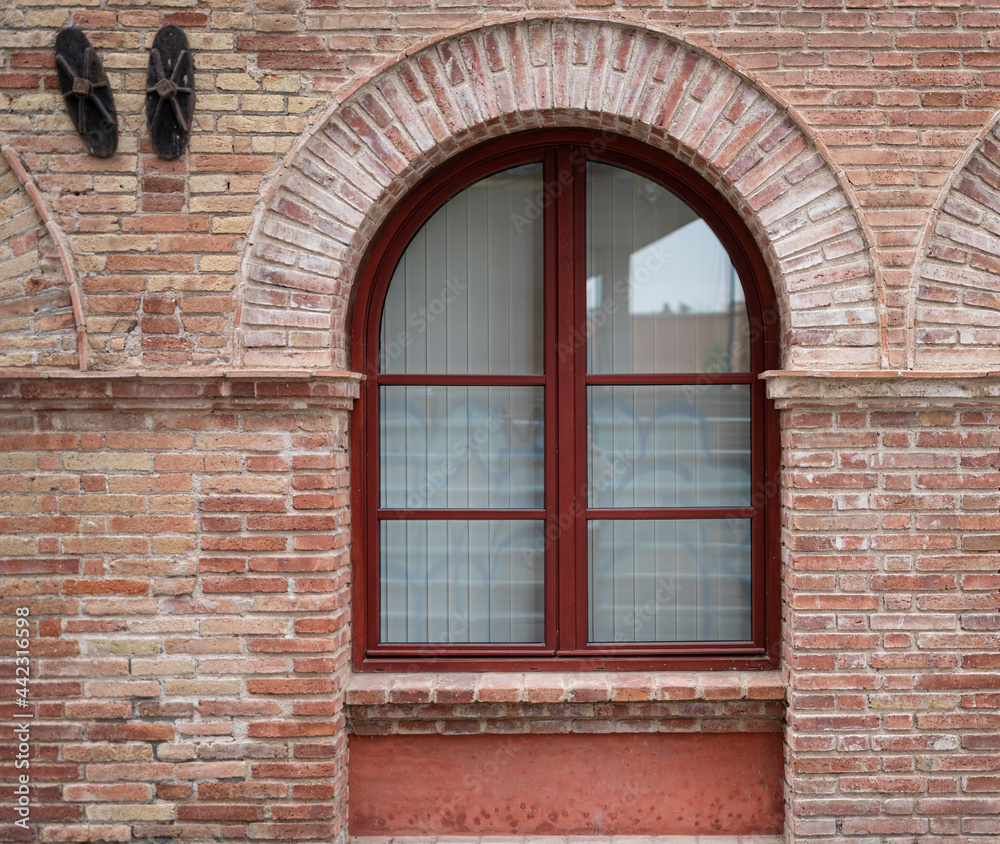 Detail of a window in a brick wall
