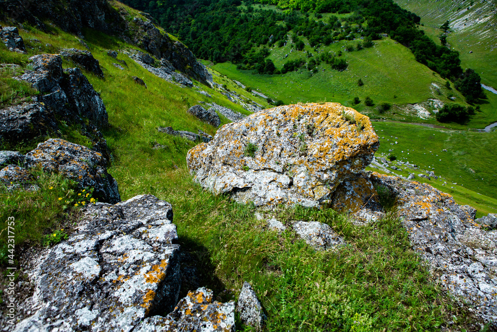 Beautiful green landscapes with hills, forest and rocks in Moldova. Eco tourism without people. Beautiful green landscapes with hills, forest and rocks in Moldova. Eco tourism without people.