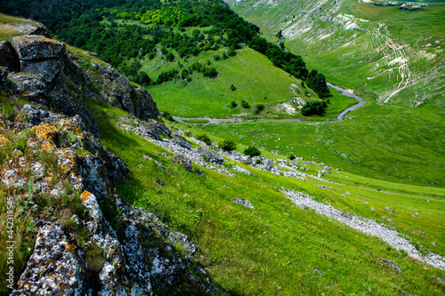 Beautiful green landscapes with hills, forest and rocks in Moldova. Eco tourism without people.