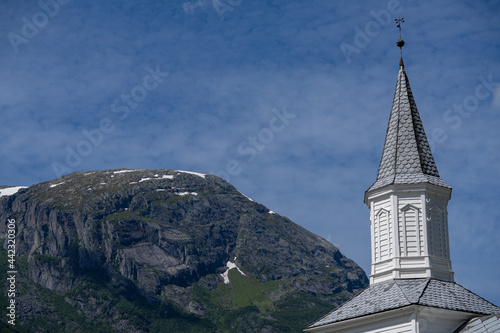Odda Kirke (Odda Church) with the mountain Lauvhoggen in the background. © OddHelge