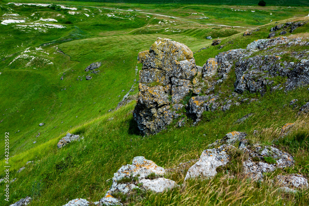 Beautiful green landscapes with hills, forest and rocks in Moldova. Eco tourism without people. Beautiful green landscapes with hills, forest and rocks in Moldova. Eco tourism without people.