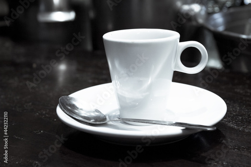 Fototapeta Naklejka Na Ścianę i Meble -  White cup of hot latte coffee
