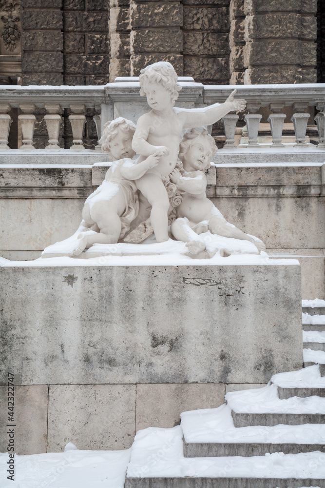 Vienna - The alegorical statue in front of Neue Burg building in winter
