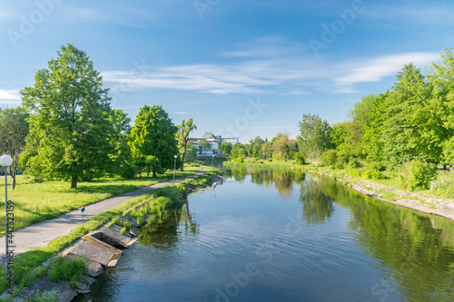 Summer view on Gwda river in city center of Pila, Poland.