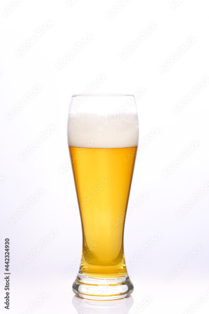 Glass of light beer on a white background. Glass of light beer on a white background.