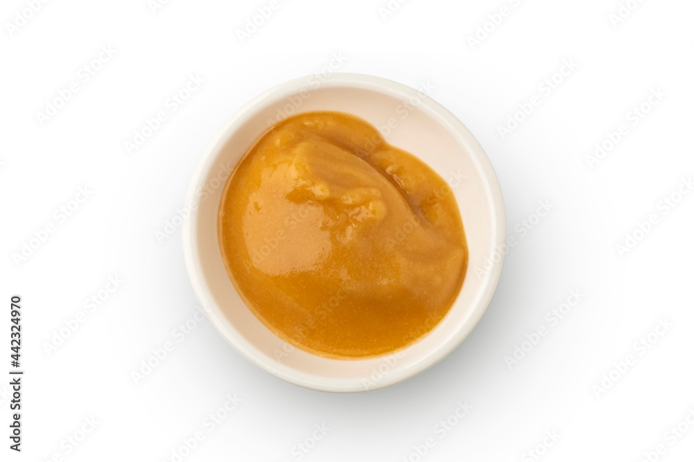 Natural Coconut palm sugar in white dish isolated on white background with clipping path.Sweet condiment for Thai Traditional food. Natural Coconut palm sugar in white dish isolated on white background with clipping path.Sweet condiment for Thai Traditional food.