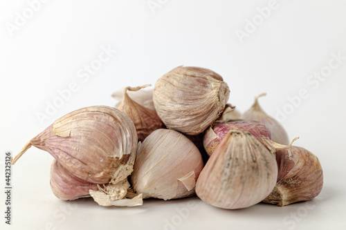 raw garlic on a white background