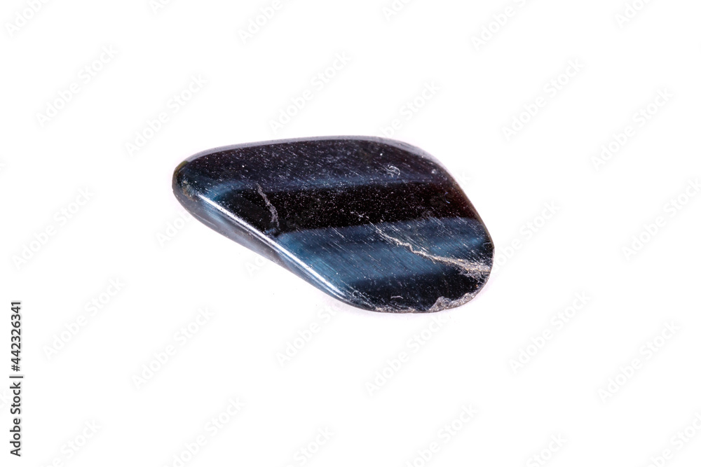 Macro mineral stone Falcon eye on a white background Macro mineral stone Falcon eye on a white background