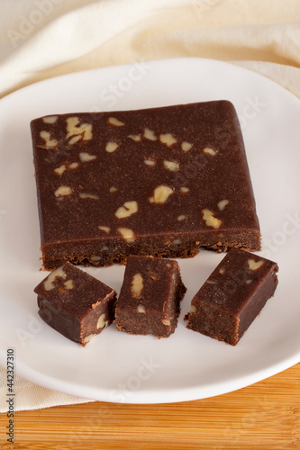 Walnut halva. Halva on wooden background. Turkish halvah for Turkish Breakfast. Local name cevizli helva