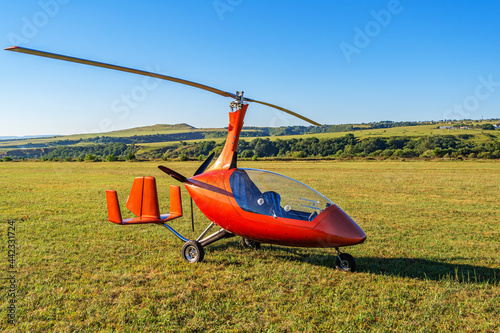 Autogyro Kalidus is parked after a flight at a mountain airfield.