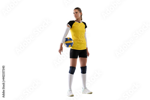 Young female volleyball player isolated on white studio background. Woman in sport's equipment and shoes or sneakers training and practicing.