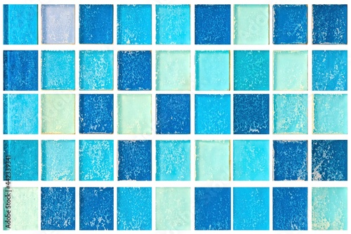 Blue pastel ceramic wall and floor tiles abstract background. Design geometric mosaic texture decoration