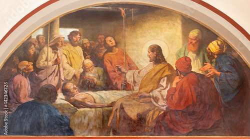 Obraz na płótnie VIENNA, AUSTIRA - JUNI 18, 2021: The fresco Jesus Heals a Lame Man in Herz Jesu church from begin of 20