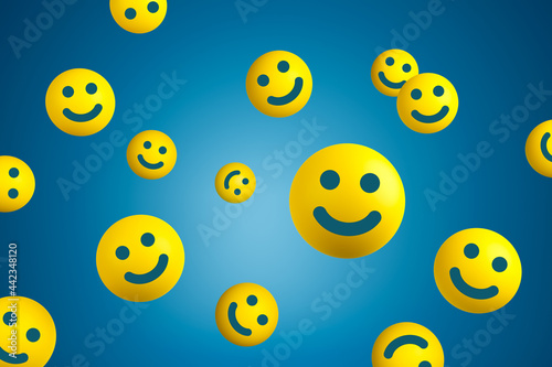 Yellow smiling balls flying on blue background. Happiness or customer satisfaction